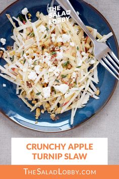 crunchy apple turnip slaw on a blue plate with a fork and text overlay