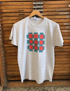 "An original hand screen printed t-shirt with a geometric design. Tees are screen printed by me and made of 100% cotton which means they are super comfy and the print colours are vibrant and long lasting. The 100% cotton tees are a thick long lasting fabric that feels nice and an oversize fit.  Size XSmall & Large I have made these in my studio in Barcelona, you can see some \"making off\" pictures in my profile ;)" Textile Designs, Hand Screen Printed, Hand Print, New T, Graphic Tees Women, Textile Design, Womens Clothing Tops, Cotton Tee, Gingham