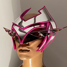 80s inspired futuristic Cyber goggles ,eyewear, glasses,sci fi, futuristic eye wear,head mask great for burning man or any rave festival for men and women . Made out of rigid mirror pvc, clean retro futuristic lines. These futuristic goggles are perfect for any performer. This eyewear has a pink see through visor from the inside out. These goggles are fuxia lined on the inside . Made out of lightweight chrome mirror pvc. Comfortable adjustable clear band on Futuristic Halloween Masks And Prosthetics, Adjustable Eye Mask For Festival, Adjustable Eye Mask For Festivals, Futuristic Adjustable Masks And Prosthetics For Cosplay, Futuristic Adjustable Masks For Masquerade, Adjustable Rave Masquerade Masks And Prosthetics, Adjustable Rave Masks For Masquerade, Adjustable Rave Masks And Prosthetics For Masquerade, Futuristic Adjustable Masquerade Masks And Prosthetics