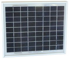 a solar panel mounted to the side of a wall with multiple squares on it,