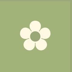 a white flower on a green background