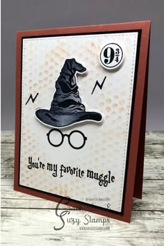 a card with a wizard hat and glasses