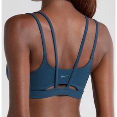 Nwot Ships Same Day! Color: Armory Navy/ White Low-Impact Support; Ideal For Studio And Yoga. Signature Dri-Fit Tech Keeps You Dry And Comfortable In This Strappy Sports Bra With A Foam Pad Insert For Extra Coverage. Elasticized Straps Dri-Fit Moisture-Wicking Technology Lined 63% Nylon, 37% Spandex Machine Wash, Line Dry Imported Item #107641 Sporty Nike Activewear, Blue Nike Sports Bra For Training, Nike Blue Sports Bra For Training, Nike Blue Sports Bra For Workout, Nike Sporty Blue Sports Bra, Nike Blue Sports Bra With Moisture-wicking, Blue Athleisure Sports Bra For Loungewear, Nike Blue Moisture-wicking Sports Bra, Nike Yoga Top With Built-in Bra