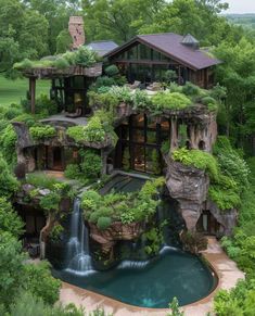 an aerial view of a house with a waterfall