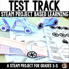 an image of a paper car on top of some construction materials with the text test track