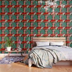 a bedroom with a bed, chandelier and wallpaper that has an image of a woman's face on it