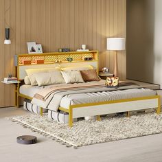 a bedroom with a bed, nightstands and rug on the floor in front of it