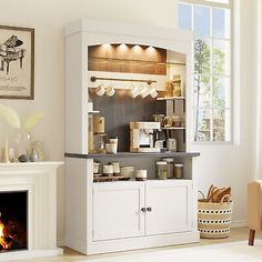 a living room filled with furniture and a fire place in front of a white fireplace