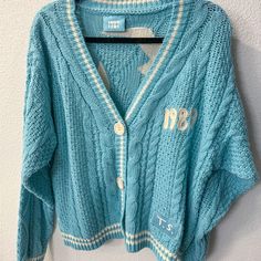 Brand New, Never Worn. Perfect Condition Oversized Xs/S Cardigan. Blue Casual Cable Knit Cardigan, Casual Blue Cable Knit Cardigan, Blue Cable Knit Casual Cardigan, Blue Cable Knit Cardigan For Spring, Vintage Blue Cotton Cardigan, Blue Cable Knit V-neck Cardigan, Casual Light Blue Winter Cardigan, Casual Blue V-neck Cardigan, Trendy Light Blue Cotton Cardigan