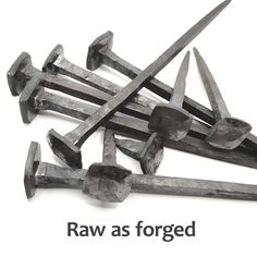 a pile of metal nails sitting on top of each other with the words raw as forgot