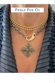 If you’re looking for a bold statement piece and a little attitude we’ve got you covered….. Our mixed metal Jerusalem cross has a vintaged antique silver finish with gold highlights. We paired it with a heavy textured gauged oval link chain in antique silver with an oversized contrasting matte gold lobster clasp. Chain Measures 17” long, all materials are free from cadmium, lead, and nickel. Limited edition, pre-order only, allow two weeks for delivery.