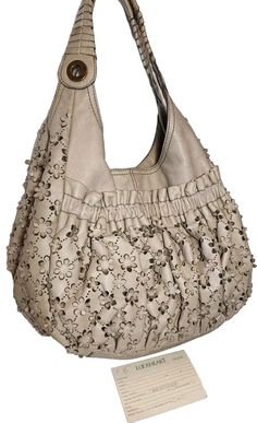 Spring Textured Leather Bags, Spring Soft Leather Hobo Bag, Spring Leather Hobo Bag, Daisy May, Lazer Cut, Top Floral, Leather Work, Logo Stamp, Over The Top