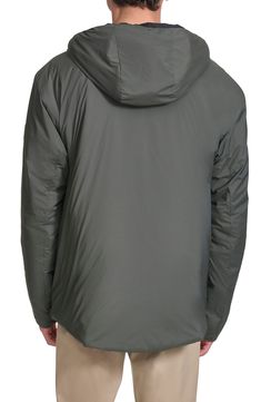 Stay warm and dry in this lightweight nylon rain jacket constructed with a fixed hood and secure zip pockets. 30" length Front zip closure Fixed hood Chest zip pocket; front zip pockets Lined, with 100% polyester fill 100% nylon Machine wash, tumble dry Imported Hooded Nylon Raincoat For Outdoor Activities, Midweight Nylon Long Sleeve Windbreaker, Midweight Long Sleeve Nylon Windbreaker, Midweight Nylon Windbreaker With Pockets, Hooded Nylon Raincoat For Hiking, Nylon Long Sleeve Hooded Jacket For Rainy Weather, Weatherproof Nylon Long Sleeve Raincoat, Hooded Nylon Windbreaker For Hiking, Functional Long Sleeve Weatherproof Hooded Jacket