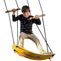 a boy on a surfboard is swinging from the rope to the board with two poles