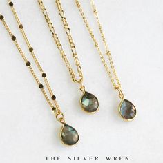 This dainty necklace is a great way to add a little color to your everyday.  Simple, classic and versatile this labradorite necklace comes in your choice of chain style.  D E T A I L S *Dainty genuine natural labradorite drop -10mm. *Choose your chain style. *Necklace chain is 16kt Gold-Filled. L E N G T H   *Please select from the drop down selection. *The standard length is normally 18". *Model is wearing 18" in Photos. HOW TO PERSONALIZE *Select your choices from the drop down menu to create your custom design. ∙ EXTRA LOVE ∙ Handcrafted just for you in sunny Arizona by a team of talented women. All of our jewelry comes gift packaged! We are happy to leave a note if this is a special gift, just let us know in the message box at checkout. PRODUCTION ∙ TIMES All items are made to order. P Dainty Everyday Necklaces With Natural Stones, Dainty Teardrop Pendant Necklace With Natural Stones, Elegant Labradorite Necklaces With Birthstone, Dainty Labradorite Jewelry For Everyday, Elegant Labradorite Necklace With Adjustable Chain, Dainty Gemstone Drop Necklace For Gift, Dainty Labradorite Pendant Necklace, Dainty Labradorite Jewelry Gift, Elegant Labradorite Necklace For Gift