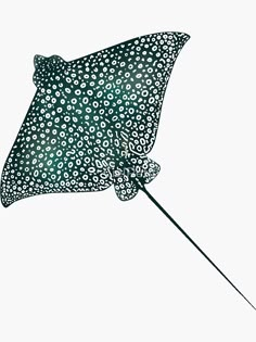 an animal print umbrella is flying through the air with its handle extended and it's cover partially open