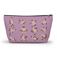 a small purple pouch bag with pugs on it