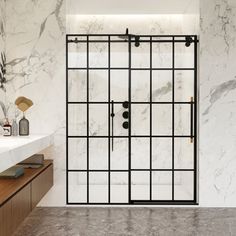 a bathroom with marble walls and flooring