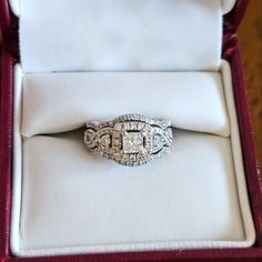 Size 5 Helzberg Diamonds Platinum Diamond Bridal Set. 1/2 Ct Center Princess Cut With 86 Round Brilliant Cut Accent Diamonds Weighing Approximately 5/8 Ct. The Second Platinum Diamond Band Was Purchased Separately Years Later But Was Never Soldered. It Was Worn Very Little. It Is 1/10 Ct. I Don't Have A Certificate Of Authenticity Or Appraisal For The Second Band, But It Is The Same As The Other One. Please Ask Any Questions Or Request Additional Photos. Luxury Bridal Set With Diamond Accents, Heirloom Princess Cut Jewelry With Diamond Accents, Heirloom Jewelry With Diamond Accents, Princess Cut, Elegant Princess Cut Diamond Bridal Sets, Princess Cut Diamond Bridal Sets In Diamond White, Luxury Diamond Bridal Sets With Accents, Exquisite Princess Cut Diamond White Jewelry, Princess Cut Pave Setting Jewelry For Wedding, Fine Jewelry Bridal Sets With Princess Cut Diamond