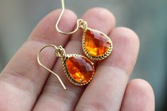 Burnt Orange Earrings Amber Gold Jewelry - Tangerine Bridesmaid Earrings Wedding Earrings Amber Bridesmaid Jewelry Orange Wedding Jewelry The burnt orange teardrop measures overall 19mm by 12mm (including the loop). The glass in the middle of the teardrop measures 13mm by 10mm by 6mm. The earwires are 14k gold filled. Also in silver: https://www.etsy.com/listing/195437184/silver-burnt-orange-earrings-amber The length of the earrings is a little over 1 inch. These earrings are simply stunning! Yo Orange Jewelry Set, Tangerine Wedding, Orange Bridesmaid, Orange Jewelry, Wedding Bridesmaid Jewelry, Orange Earrings, Orange Wedding, Earring Cards, Earrings Wedding