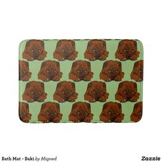 a bath mat with a brown dog on it's face and the background is green