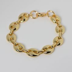 24k Gold Filled Anchor Chain 18k Heavy gold plated clasps 11mm width *Gold-filled jewelry is jewelry composed of a solid layer of gold (typically constituting at least 5% of the item's total weight) mechanically bonded to a base alloy). Which means like solid gold, this piece is tarnish resistant, fade resistant and water resistant. Gold-plated Bracelet With Chunky Oval Link Chain, Gold Plated Chunky Chain Link Bracelet, Gold Plated Chunky Link Bracelet, Gold-plated Link Bracelet With Gold Clasp, Gold Plated Link Bracelet With Gold Clasp, Gold Plated Link Bracelet, Gold-plated Chunky Link Bracelet, Gold-plated Link Bracelet, Formal Gold-plated Bracelet With Chunky Chain