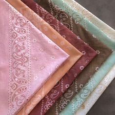 "One of a kind sun bleached bandanas hand dyed in a range of hues.   These are intended to have a vintage vibe. Classic Americana design with traditional paisley and floral motifs.  Multi-purpose- use as scarf, handkerchief, face cover, pet bandana, or even as Furoshiki (reusable gift wrap)  100% cotton bandana is lightweight, soft and drapey.  Contrast stitching along the edge will be darker than the fabric.  ~20\" X 20\" after being dyed and washed.   Some colors have a logo  printed on one co Bandanas Diy, Vibe Classic, Scarf Hair Tie, Americana Design, Reusable Gift Wrap, Paisley Bandana, Scarf Hair, Classic Americana, Black Phone