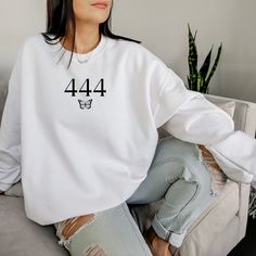 "Angel Numbers Sweatshirt ♥ thank you for shopping small ♥ Please let me know what numbers you would like printed on your sweatshirt in the \"personalize\" box. As every sweatshirt is made with love just for you, please allow 3-7 days processing time before shipment." Angel Numbers Sweatshirt, Angel Number Shirts, Angel Numbers Shirt, Angel Number Sweatshirt, Angel Number Shirt, Albanian Shirt, 888 Angel Numbers, 444 Angel Numbers, Angel Sweatshirt