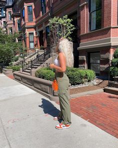 Orange Nike Dunks Outfit, Birthday Vegas Outfit, Orange And Olive Green Outfit, Olive Green And Orange Outfit, Orange Nike Outfit, Green Army Pants Outfit, Olive Green Dunks Outfit, Orange Dunks Outfit, Panda Dunk Outfits