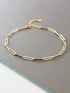 NOT GOLD PLATED, NOT GOLD FILLED! All our jewelry are stamped with a gold hallmark to certify the metal purity of the item. Product Details ☑14K SOLID GOLD ☑CHAIN WIDTH: 2.4MM ☑CHAIN LENGTH: 17+1.5CM EXTENSION CHAIN 💓Tarnish resistant and sweat resistant  💓Hypoallergenic, made without lead, nickel and cadmium Gold Information *9K gold is 9 parts pure gold or 37.5% pure. *10K gold is 10 parts pure gold or 41.7% pure. *14K gold is 14 parts pure gold or 58.5% pure. *18K gold is 18 parts pure gold Elegant Gold Paperclip Bracelets, Dainty Gold Oval Bracelets, Everyday Gold Oval Paperclip Bracelet, Gold Paperclip Bracelet Tarnish Resistant, Gold Oval Bracelet With Adjustable Chain, Classic Gold Paperclip Bangle Bracelet, Gold Oval Paperclip Chain Bracelet, Oval Paperclip Chain Bracelet Gift, Gold Oval Bracelet As Gift