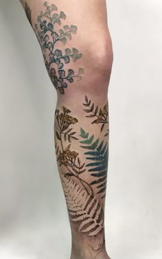 a person with tattoos on their legs