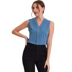 This elegant work blouse featuring a sleeveless design, and a v-neck has a basic style. You can pair this blouse with a variety of skirts, jeans, leggings, sneakers, or heel sandals to complete a casual look. This satin blouse with v neckline has a subtle texture with a solid color for a professional woman look. The soft and smooth fabric ensures all-day comfort. Leggings Sneakers, Skirts Jeans, Jeans Leggings, Satin Blouse, Professional Women, Heels Sandals, Work Blouse, Basic Style, Blue Blouse