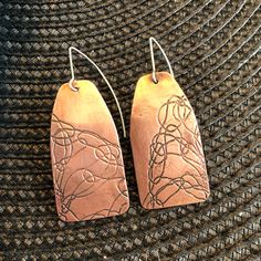 Hand-manipulated wire is printed on copper sheet via roll mill, oxidized and buffed with steel wool to enhance the design. Everyday wearable art. Copper Sulphate, Pendulum Earrings, Printed Earrings, Art Jewelry Earrings, Rolling Mill, Hydraulic Press, Copper Design, Earring Inspiration, Copper Sheets