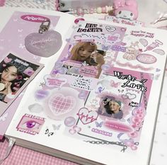 an open scrapbook with pictures and stickers on it