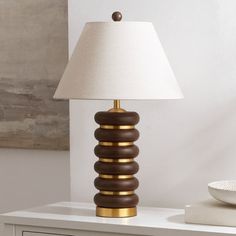 a lamp sitting on top of a white table