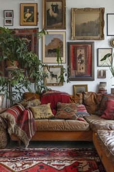 a living room filled with lots of furniture and pictures on the wall above it's couch