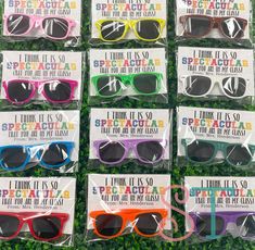 six pairs of colorful sunglasses for sale in a store display case with the words, i think it's so fabulous to be my daughter