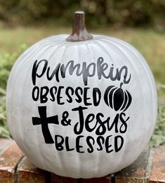 a pumpkin with the words pumpkin, dressed and jesus's blessing painted on it