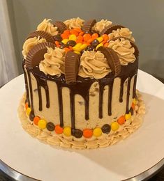 a chocolate cake with candy and candies on top