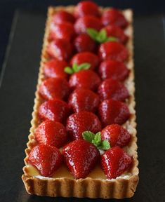 there is a pastry with strawberries on it