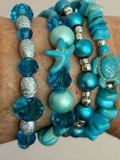 These 4 tropical bracelets are made with coordinating turquoise beads on a durable stretch cord that measure approximately 7" long. Layer them in any way to reflect your own mood or personality! Note: If you need a different size, please ask- I'm happy to work with you! Tropical Bracelets, Womens Gift Ideas, Bracelets Layered, Bracelets Beach, Teal Bracelet, Stackable Beaded Bracelets, Long Layer, Stack Bracelets, Bracelet Stacks