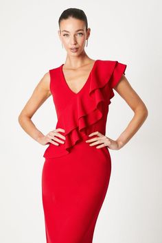 Exquisite ruffle detailing cascades elegantly across the shoulders and neckline
Bodycon silhouette hugs the figure in scuba fabric
Plunging V-neckline adds an alluring touch
Knee-length pencil skirt with a sultry front slit
Fully lined for a smooth, flattering fit
Radiate sophistication and confidence in this striking dress from Coast. The ruffle embellishments and form-fitting scuba fabric create a captivating look that exudes elegance. Pair it with sleek heels and a clutch for a polished ensemble suited for formal occasions like weddings, cocktail parties, or the races. The plunging neckline and thigh-high slit add a touch of allure, making this dress a showstopper for any special event. Plus Size Elegant Dresses, Plus Size Elegant, Knee Length Skirt Pencil, Scuba Fabric, Dress For Summer, Bodycon Midi Dress, Cocktail Parties, Bodycon Midi, Fit N Flare Dress