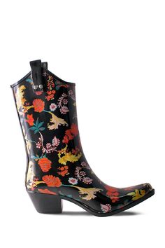 Stay dry in vibrant printed Western-style rain boots with a pull tab topline and chic block heel.Sizing: Whole sizes only; for 1/2 sizes, order next size up. . Pointed toe. Solid vamp. Rubber construction. Waterproof . Printed outer. Pulls on over leg. Lined interior. Lightly padded footbed. Pull tabs at sides. Back contrast stripe. Block heel. Assorted colors and prints. Approx. 9" shaft height, 13" opening circumference. Approx. 2" heel. Imported Rubber upper and sole Trendy Weatherproof Rain Boots, Multicolor Floral Print Boots For Summer, Multicolor Floral Print Summer Boots, Trendy Rain Boots For Rainy Weather, Black Rain Boots For Spring Rainy Weather, Weatherproof Spring Rain Boots, Rain Boots Women, Rain Boot, Rubber Rain Boots