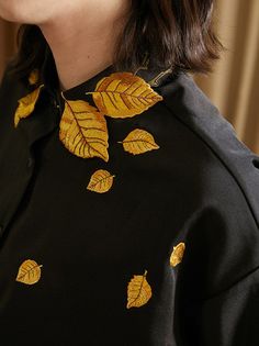 Step into elegance with our Golden Leaf Embroidered Blouse. This exquisite blouse features shimmering golden leaf embroidery that catches the light beautifully, evoking the radiant glow of sunlight. Imagine the joy and confidence you'll feel wearing this piece. Versatile and stylish, it pairs perfectly with jeans, shorts, skirts, and more, making it a must-have addition to your wardrobe. Materials:High-quality polyester for a soft and comfortable fit Design Features:Intricate golden leaf embroid Gold Festive Blouse For Fall, Festive Gold Blouse For Fall, Embroidered Gold Tops For Summer, Embroidered Gold Top For Spring, Gold Embroidered Top For Spring, Elegant Long Sleeve Blouse With Gold Embroidery, Gold Embroidered Summer Tops, Yellow Embroidered Tops For Fall, Spring Embroidered Gold Top