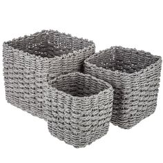 three grey woven baskets sitting on top of each other in front of a white background