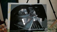 a darth vader painting on a canvas in front of a black and white background