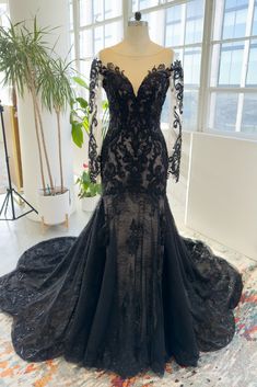 a black dress on display in a room