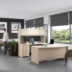 an office with two desks and a chair