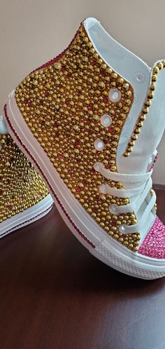 All sneakers are HANDMADE & designed with SWAROVSKI crystals and pearls. Great for birthdays, social events, weddings, proms, school events or just to get your shine on. PLEASE NOTE BOTH SIDES OF THESE SNEAKERS ARE FULLY BLINGED (BEDAZZLED Converse runs a half size larger; I highly recommend getting sized before placing an order. Due to the nature of PERSONALIZED products, I DO NOT offer REFUNDS, RETURNS, OR EXCHANGES unless it is my mistake on the design process. CURRENT TURNAROUND IS 7 TO 10 D Blinged Shoes, Bedazzled Converse, Sparkly Converse, Rhinestone Converse, Shoe Custom, Customised Clothes, Women Converse, Bedazzled Shoes, Bling Converse