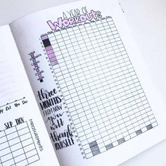 an open planner book with handwritten workouts on the pages and numbers in it